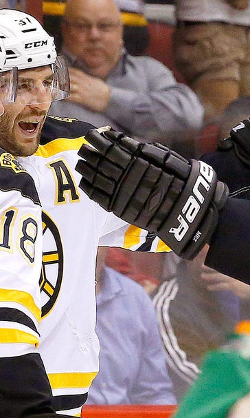 Bruins rally in 3rd period win 12th in a row